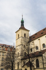 Fototapeta na wymiar Tower of a Catholic Cathedral on the Prague street