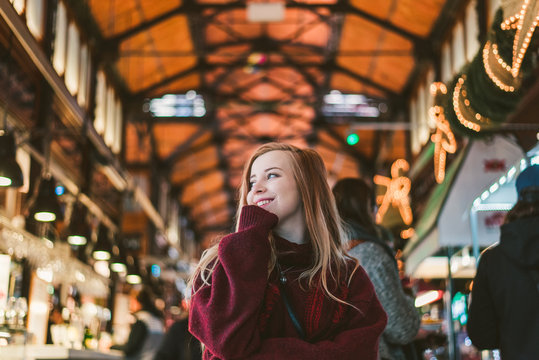 Cheerful woman at cases