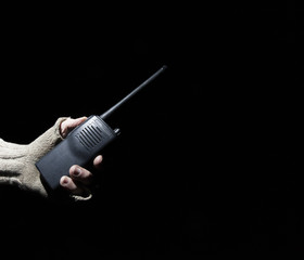 Walkie-talkie in a hand