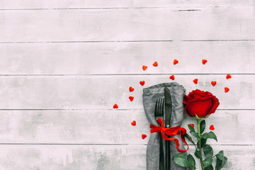 Valentine Series, Red rose and cutlery on  wooden background