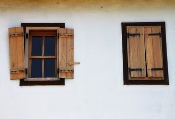 Fototapeta na wymiar Two wooden window on traditional house , Bosnia and Herzegovina