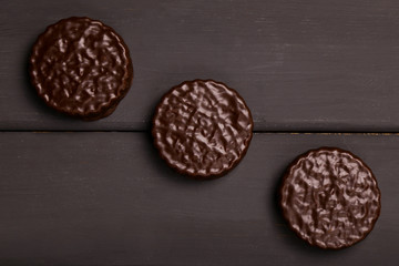 Chocolate chip cookies on a wooden background