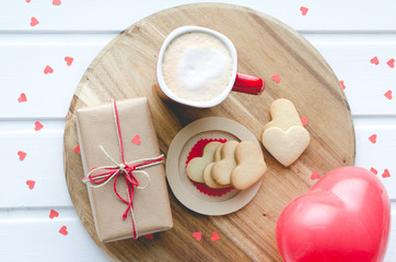Valentine's Day, biscuits and balloon-shaped heart and cup of coffee,