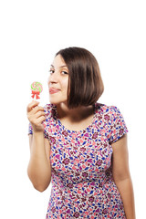 girl in pink with lollipop