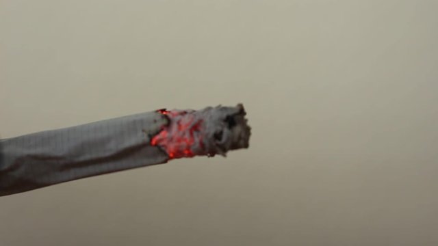 Timelapse fast cigarette smoking