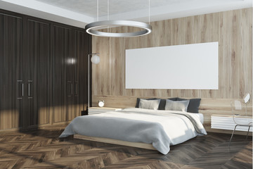 Wooden bedroom corner with poster