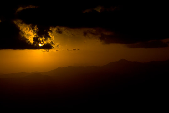 Sunset over the Himalayas as seen from Tunganath, India.