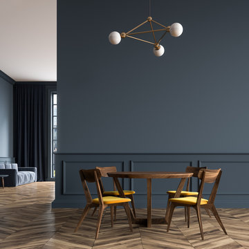 Black dining room, wooden chairs