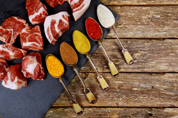 Perfect Raw Pork Neck with Spices, Wooden Cutting Board. Top View