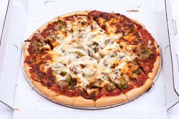 Chicago classic thin crust sausage, mushrooms, green peppers and onion pizza