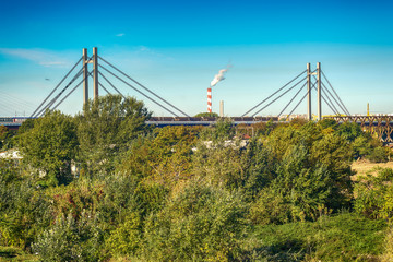 Railway bridge in Belgrade and big chimney