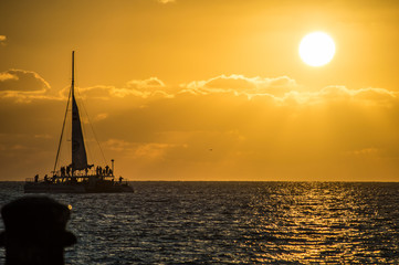 Fototapeta na wymiar Sailing Boat at Sunset