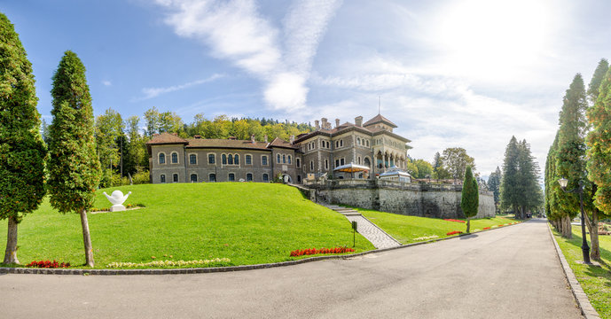 Cantacuzino Castle in a panoramic wide view on a sunny summer day with this beautiful neo romanian national monument landmark