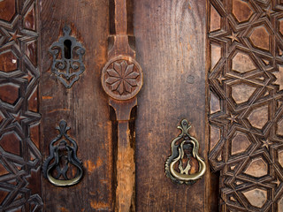 historic wooden door and very old door handles