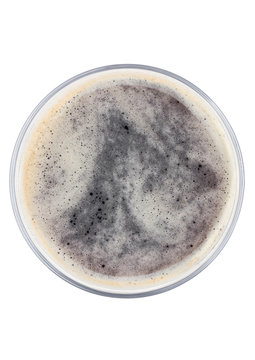 Glass Of Dark Stout Beer Top View With Foam