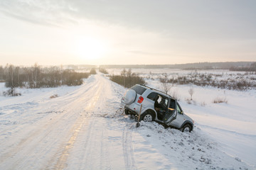 To dig out the car from snow. The car has flown after the journey to snow.