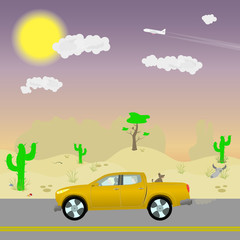 Girls with dog going to vacation driving yellow pickup in the middle of prairies.