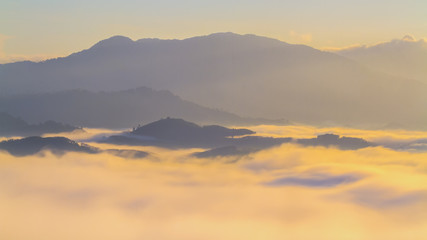 Beautiful sunrise in the morning over foggy tropical forest, on Viewpoint Phang Nga, Thailand, Long exposure photography.