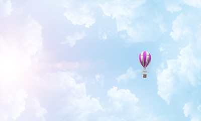 Obraz premium Flying hot air balloon in the air.