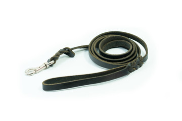 Fototapeta premium Pet leash of black leather isolated on white background. Concept pet supplies about leash.
