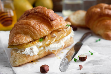 croissant with pear, cream cheese and honey