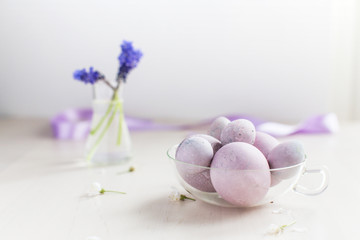 Easter eggs collored in pale purple