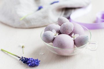 Fototapeta na wymiar Easter eggs collored in pale purple