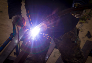 Sparks from welding at the construction site