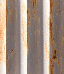 Rusty metal fence as a background