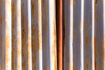 Rusty metal fence as a background