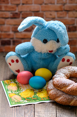 Colorful festive easter eggs and easter sweet baking