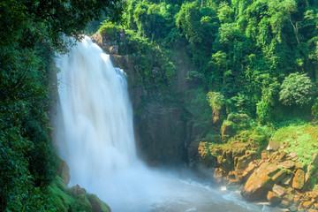 Waterfall in rainforest at National Park, Thailand.