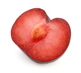 Half of red plum fruit isolated on white background