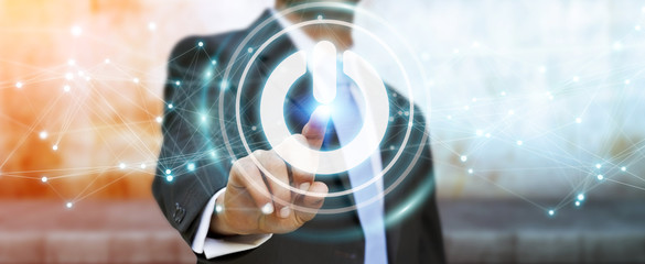Businessman using 3D render power button with connections