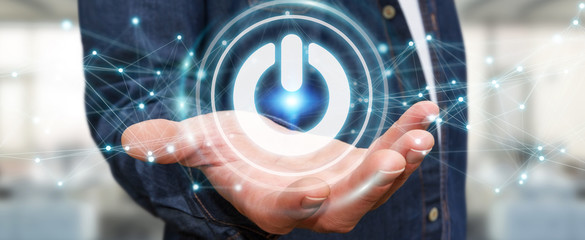 Businessman using 3D render power button with connections
