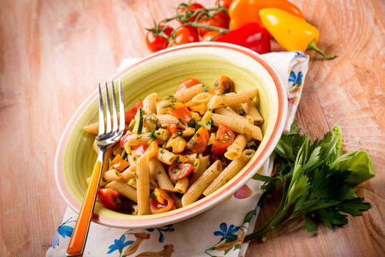 pasta with fresh tomatoes and capsicum,selective focus