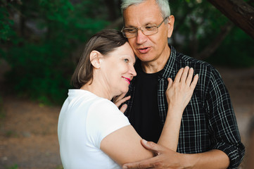 Senior couple strolling in the park