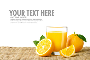 Glass of fresh orange juice on a rattan basket, Fresh fruits Orange juice in glass with group isolate on white background with copy Space for your