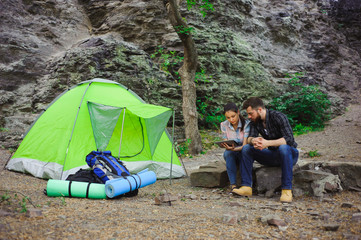 Couple camping in the mountains