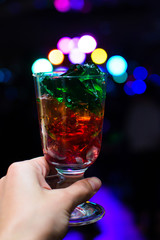 dessert jelly keeps hand on bokeh background