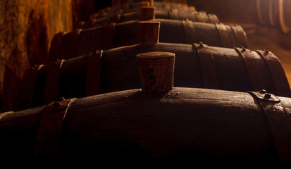 Naklejka na ściany i meble barrels with the wine in the old basement.