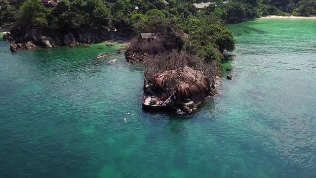 Drone flying above koh Raham area, Haad Son sand beach and Secret beach at koh Phangan island,Thailand