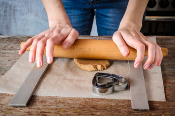 making ginger biscuits at home in the kitchen.