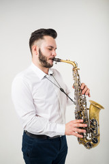 Obraz na płótnie Canvas Saxophone Player Saxophonist with Sax