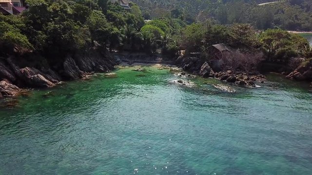 Drone flying above koh Raham area, Haad Son sand beach and Secret beach at koh Phangan island,Thailand