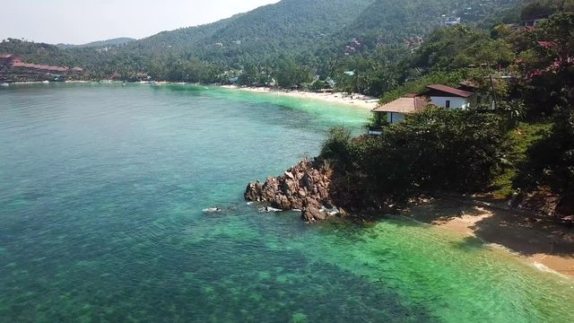 Drone flying above koh Raham area, Haad Son sand beach and Secret beach at koh Phangan island,Thailand