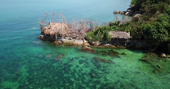 Drone flying above koh Raham area, Haad Son sand beach and Secret beach at koh Phangan island,Thailand