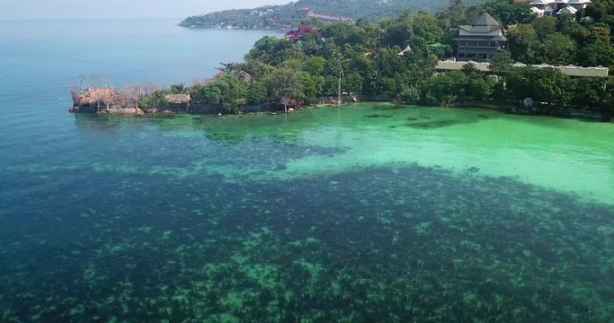Drone flying above koh Raham area, Haad Son sand beach and Secret beach at koh Phangan island,Thailand