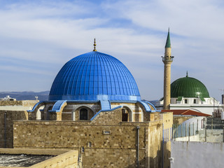 Acre or Akko, Israel - view of the typical domes, minarets and roofs of the old city of Acre.