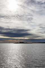 Obraz premium Islands in silhouette with a seascape sunset